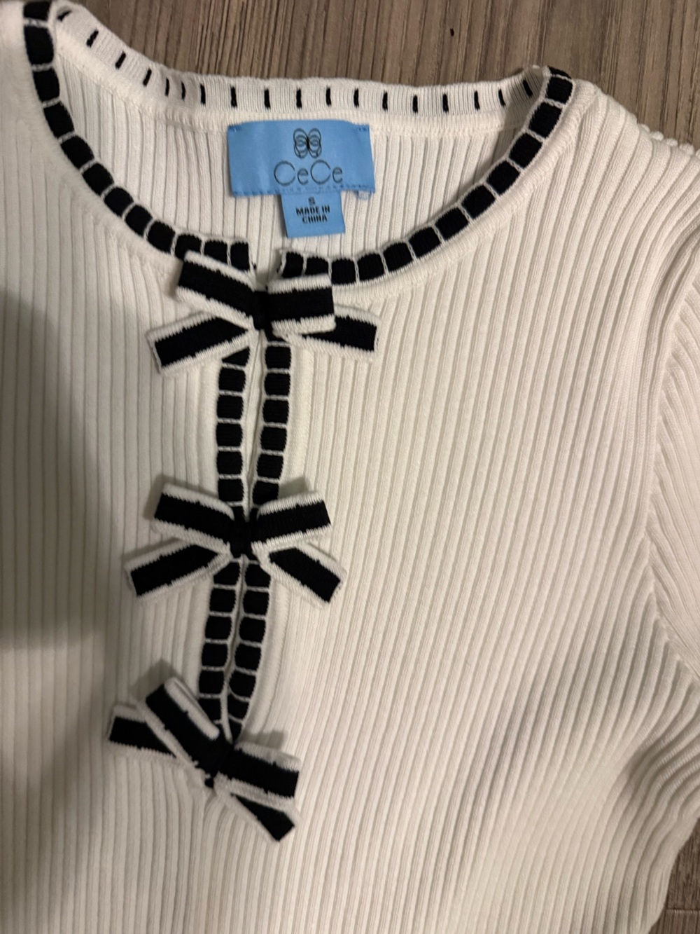 CeCe Cream Ribbed Midi Dress with Black Trim and Bows - Picture 4 of 6